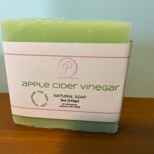 Green apple cider vinegar soap on shelf.